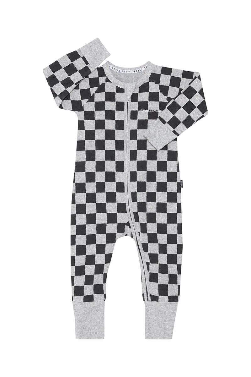 Bonds Zip Wondersuit baby sleepsuit in Check It Out black and grey check print. Front view.