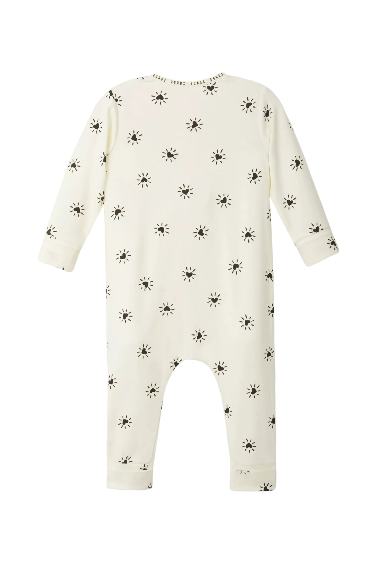 Bonds WonderGrow Zip Wondersuit bamboo baby sleepsuit in cream with black Sparkling Hearts. Back view.