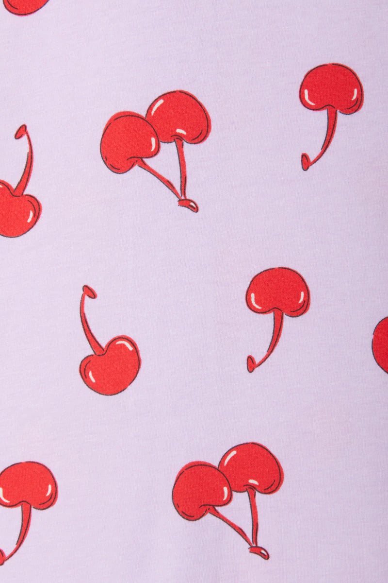 Bonds Zip Wondersuit baby sleepsuit in Cherry Picnic purple fruity print. Close up.