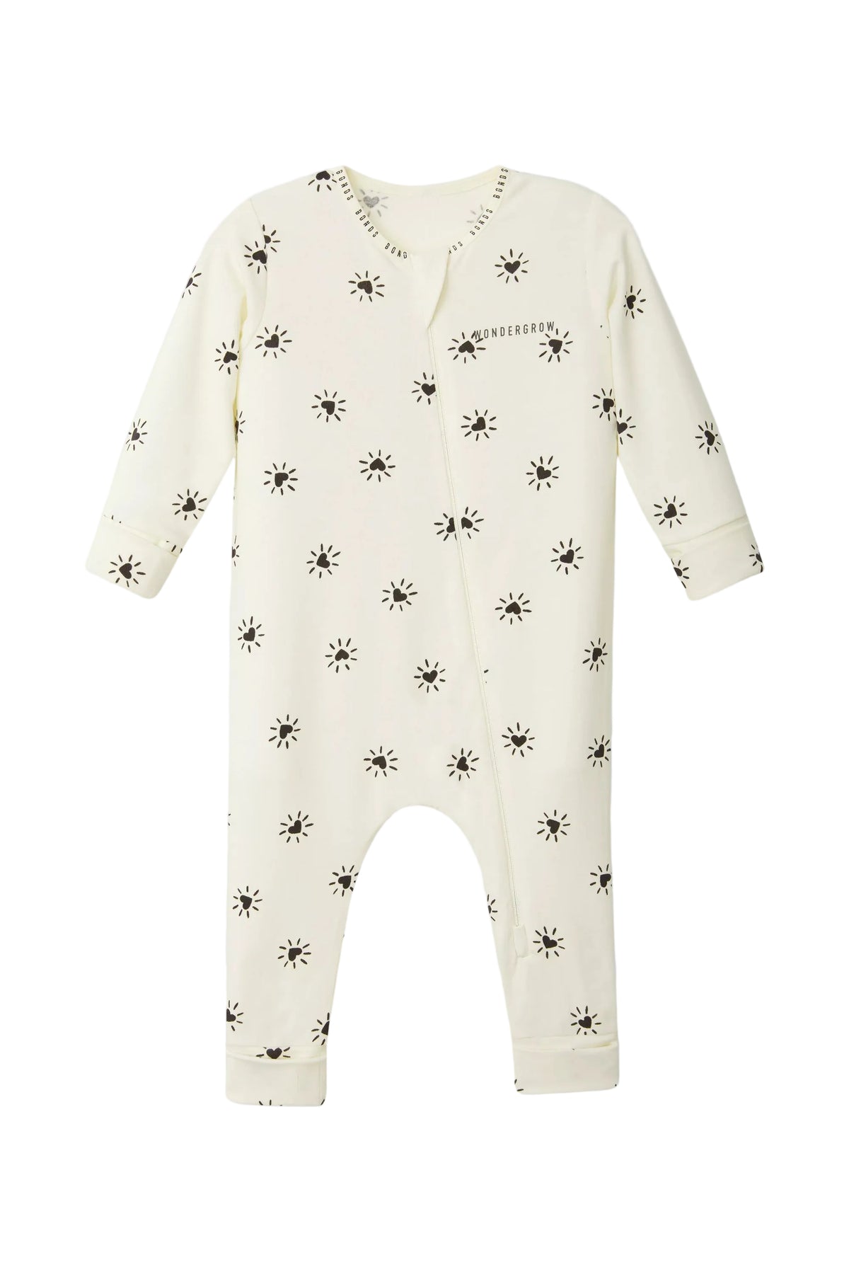 Bonds WonderGrow Zip Wondersuit bamboo baby sleepsuit in cream with black Sparkling Hearts. Front view.
