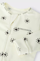 Bonds WonderGrow Zip Wondersuit bamboo baby sleepsuit in cream with black Sparkling Hearts. Close up of zip and rollable cuff.