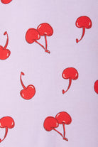 Bonds Zip Wondersuit baby sleepsuit in Cherry Picnic purple fruity print. Close up.