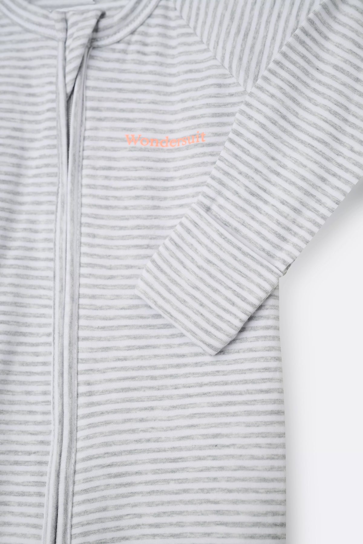Bonds Zip Wondersuit baby sleepsuit in Luxe Storm Marle grey and white stripe. Close up hand cuff.