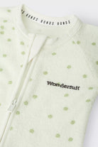 Bonds Poodlette Zip Wondersuit baby sleepsuit in Ditsy Dot Green polka dot print. Close up two-way zip.