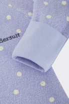 Bonds Poodlette Zip Wondersuit baby sleepsuit in Ditsy Dot Purple polka dot print. Close up hand cuff.