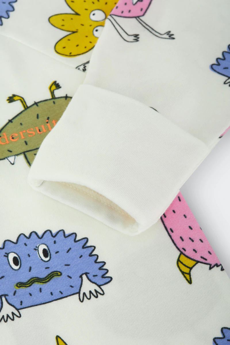Bonds Zip Wondersuit baby sleepsuit in Boo Buddy white colourful monster print. Close up hand cuff.