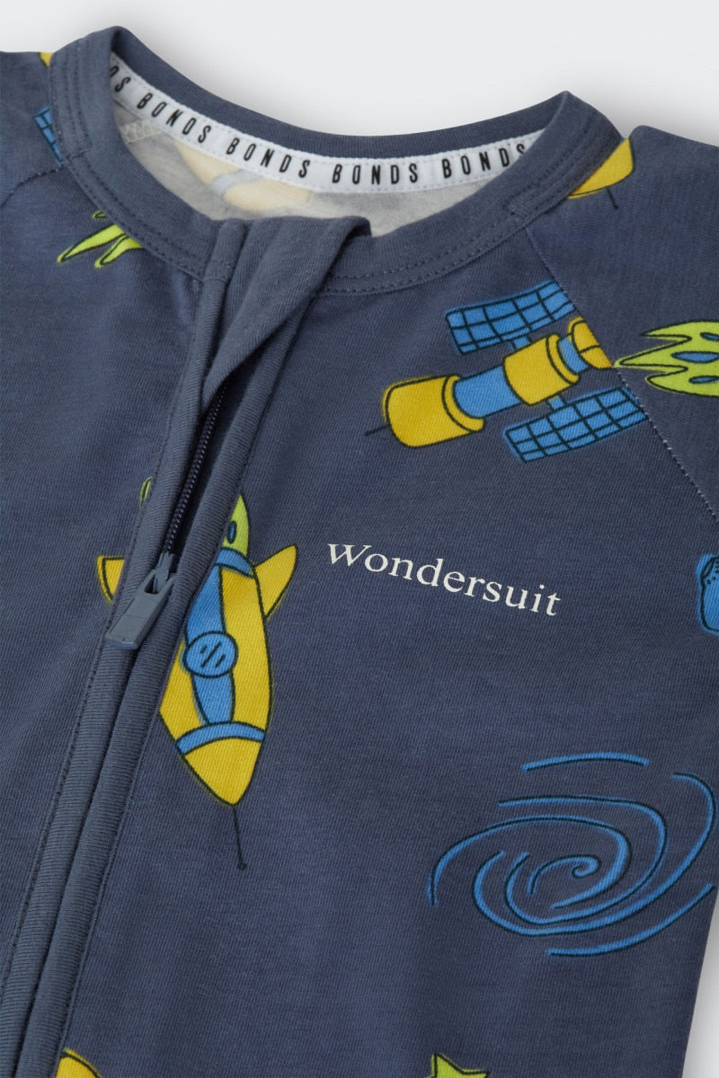 Bonds Zip Wondersuit baby sleepsuit in Out of This World navy outer space rocket print. Close up two-way zip.