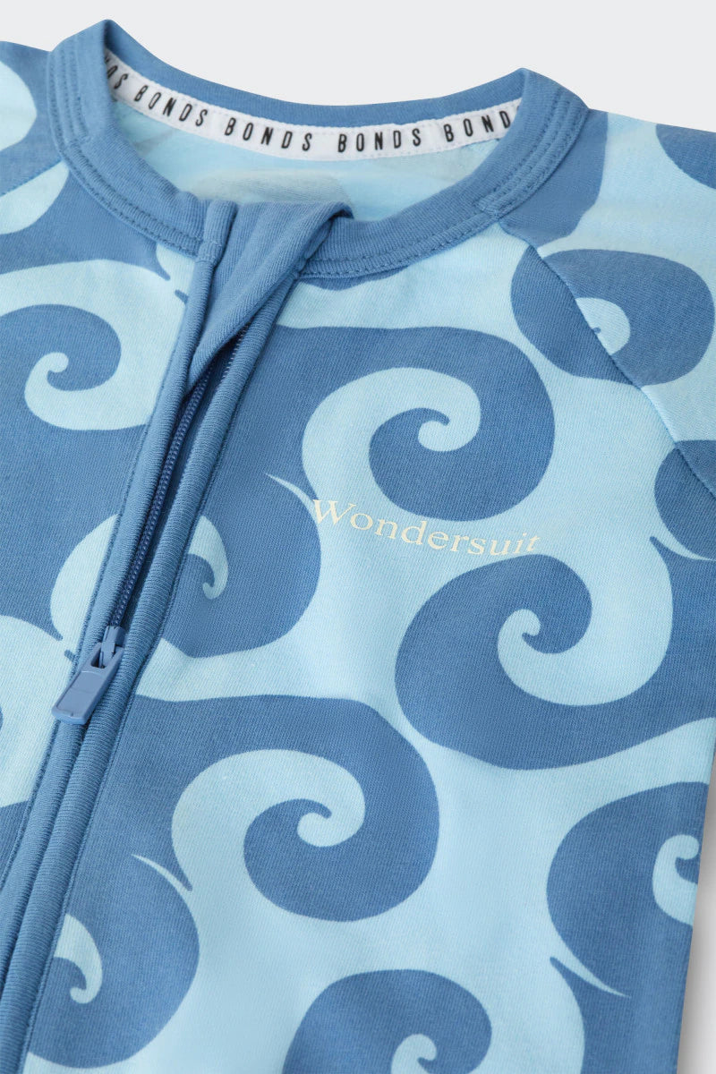Bonds Zip Wondersuit baby sleepsuit in Wave Wonders blue wave swirl print. Close up two-way zip.