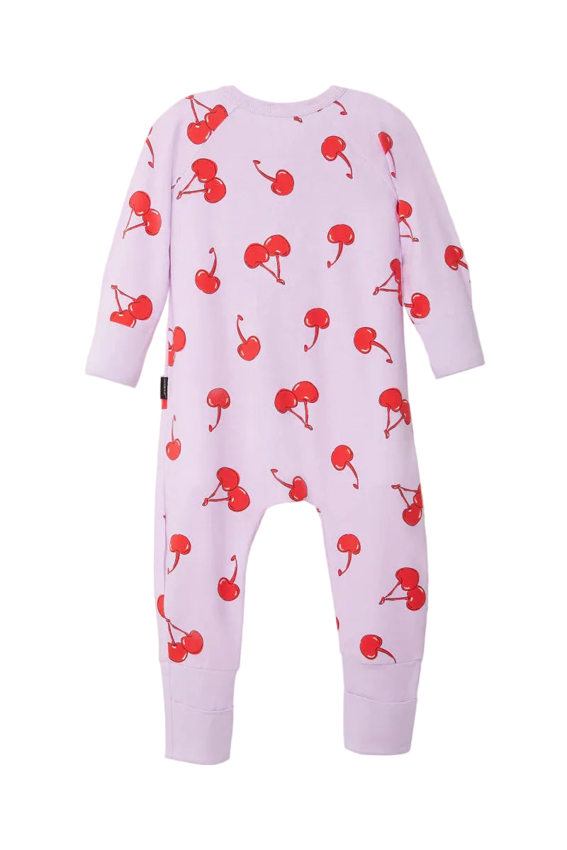 Bonds Zip Wondersuit baby sleepsuit in Cherry Picnic purple fruity print. Back view.